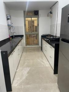 Kitchen Image of 1550 Sq.ft 3 BHK Apartment / Flat for sale in Transcon Triumph, Andheri West Mumbai for Rs. 62500000