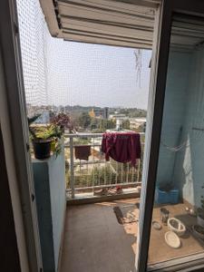 Balcony Image of 1250 Sq.ft 2 BHK Apartment / Flat for rent in SJR Blue Waters, Parappana Agrahara Bengaluru for Rs. 49000