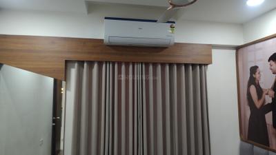 Bedroom Image of 852 Sq.ft 2 BHK Apartment / Flat for rent in Pramukh Arista, Sargasan Gandhinagar for Rs. 28000