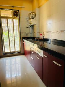 Kitchen Image of 1045 Sq.ft 2 BHK Apartment / Flat for sale in Agarwal Doshi Complex, Vasai West Vasai for Rs. 7800000
