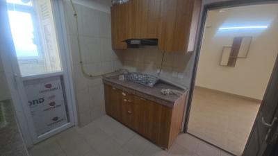 Kitchen Image of 1250 Sq.ft 2 BHK Apartment / Flat for rent in Phase 2 Noida for Rs. 32000
