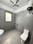Bathroom Image of Urbanroomz Coliving PG in DLF Phase 2, Gurgaon