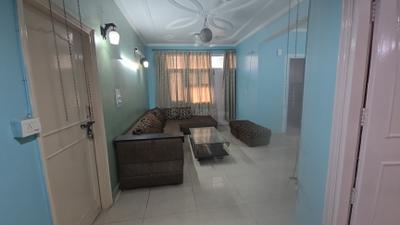 Living Room Image of 1150 Sq.ft 2 BHK Apartment / Flat for rent in Purvanchal Bhagirathi Apartments, Sector 62 Noida for Rs. 38000