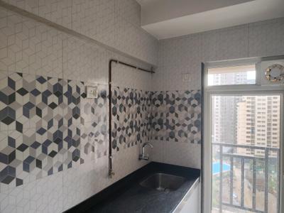 Kitchen Image of 640 Sq.ft 1 BHK Apartment / Flat for rent in Raunak Heights, Kasarvadavali Thane for Rs. 20000