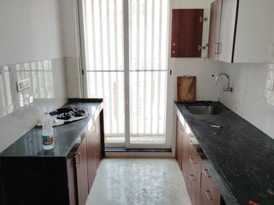Kitchen Image of 740 Sq.ft 1 BHK Apartment / Flat for sale in Vardhaman Tower, Dombivli East Thane for Rs. 5400000