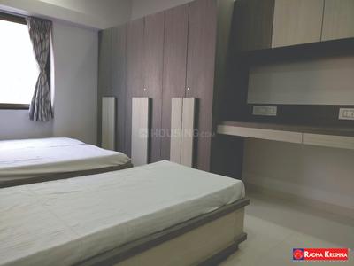 Bedroom Image of Radhakrishna Girls PG in Ambawadi, Ahmedabad