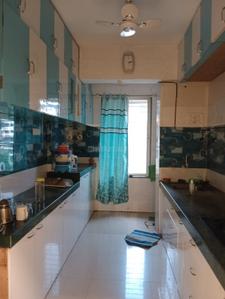 Kitchen Image of 1250 Sq.ft 2 BHK Apartment / Flat for sale in Pooja White Flag, Kamothe Navi Mumbai for Rs. 12500000