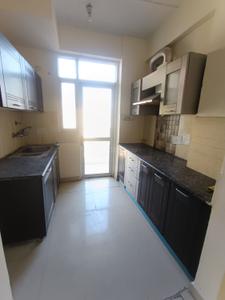 Kitchen Image of 1385 Sq.ft 3 BHK Apartment / Flat for sale in Prateek Wisteria, Sector 77 Noida for Rs. 19000000