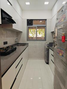Kitchen Image of 810 Sq.ft 2 BHK Apartment / Flat for sale in Elegant Residency, Andheri East Mumbai for Rs. 19900000
