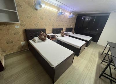 Bedroom Image of Juneja &amp; Royal Stay PG in Lajpat Nagar, New Delhi