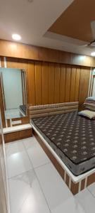 Bedroom Image of 1300 Sq.ft 3 BHK Apartment / Flat for rent in Yogi Nagar Rajkot for Rs. 32000