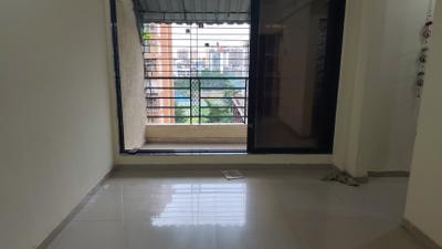 Living Room Image of 680 Sq.ft 1 BHK Apartment / Flat for sale in Laxmi Aashirwad, Panvel Navi Mumbai for Rs. 6500000