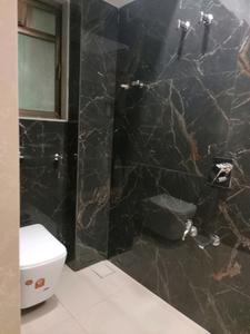 Common Bathroom Image of 680 Sq.ft 1 BHK Apartment / Flat for sale in JK Iris, Mira Road East Mira Bhayandar for Rs. 7600000