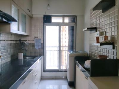 Kitchen Image of 910 Sq.ft 1 BHK Apartment / Flat for rent in Kasarvadavali Thane for Rs. 35000