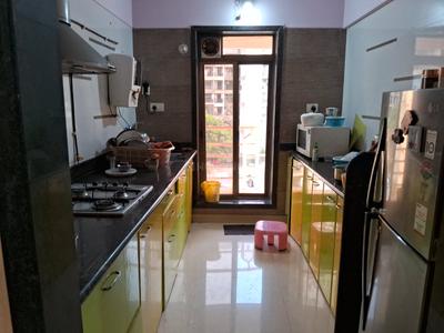 Kitchen Image of 1069 Sq.ft 2 BHK Apartment / Flat for sale in Tharwani Rosabella, Kharghar Navi Mumbai for Rs. 14000000