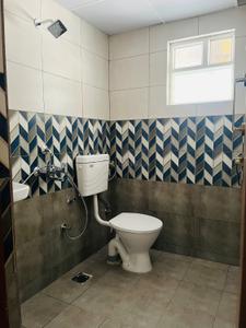 Bathroom Image of 750 Sq.ft 2 BHK Apartment / Flat for sale in Swarna Griha 4 Phase 1, Kakati Belagavi for Rs. 3900000