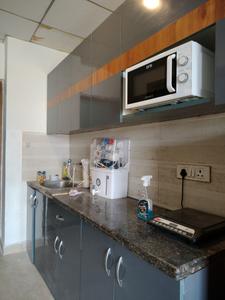 Kitchen Image of 435 Sq.ft 1 RK Apartment / Flat for rent in Paramount Golfforeste Premium Apartments, Surajpur Greater Noida for Rs. 15500