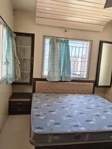 Bedroom Image of 850 Sq.ft 2 BHK Apartment / Flat for rent in Ashtavinayak City, Fursungi Pune for Rs. 22500
