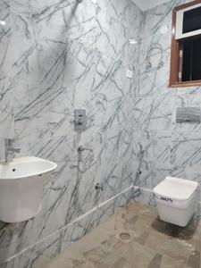 Common Bathroom Image of 1200 Sq.ft 3 BHK Apartment / Flat for sale in Mehrauli New Delhi for Rs. 8000000