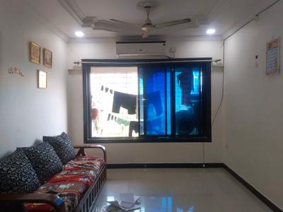 Living Room Image of 875 Sq.ft 2 BHK Apartment / Flat for sale in Kandivali West Mumbai for Rs. 13800000