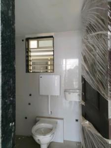 Common Bathroom Image of 650 Sq.ft 1 BHK Apartment / Flat for sale in Janki Park Building No 2, Saphale Mumbai for Rs. 2500000
