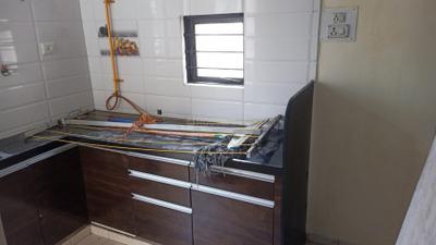 Kitchen Image of 750 Sq.ft 1 BHK Apartment / Flat for rent in Vejalpur Ahmedabad for Rs. 17000