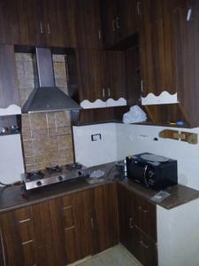 Kitchen Image of 1050 Sq.ft 3 BHK Builder Floor for rent in Sector 11 Rohini New Delhi for Rs. 32000