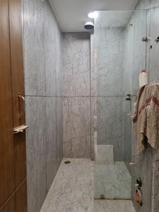 Common Bathroom Image of 1000 Sq.ft 3 BHK Apartment / Flat for sale in Dwarka Mor New Delhi for Rs. 6700000