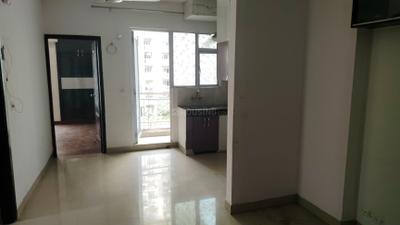 Living Room Image of 950 Sq.ft 2 BHK Apartment / Flat for rent in Aditya Urban Homes, Bamheta Village Ghaziabad for Rs. 14000