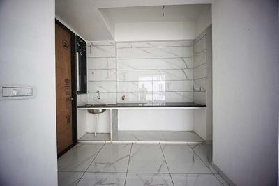 Kitchen Image of 1683 Sq.ft 3 BHK Apartment / Flat for sale in Ashwamegh Elite, Sargasan Gandhinagar for Rs. 6451000