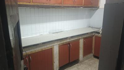 Kitchen Image of 1100 Sq.ft 2 BHK Apartment / Flat for rent in Pink Apartments, Sector 18 Dwarka New Delhi for Rs. 28000