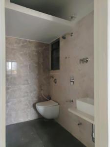 Common Bathroom Image of 670 Sq.ft 1 BHK Apartment / Flat for sale in Rajhans Moonstone, Vasai West Vasai for Rs. 6800000