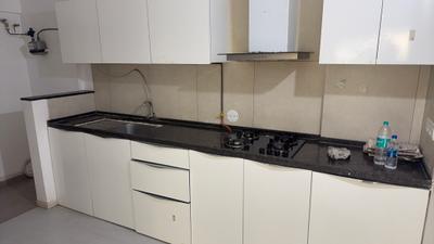 Kitchen Image of 1450 Sq.ft 3 BHK Apartment / Flat for sale in Glitterati Apartments, Pimple Nilakh Pune for Rs. 18500000