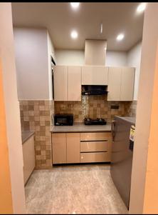 Kitchen Image of 650 Sq.ft 1 BHK Builder Floor for rent in Sector 52 Gurgaon for Rs. 29000