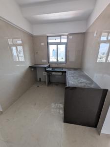 Kitchen Image of 510 Sq.ft 1 BHK Apartment / Flat for sale in Navkarmik Shiv Sneh, Kharodi Mumbai for Rs. 9175000