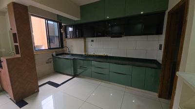 Kitchen Image of 900 Sq.ft 2 BHK Apartment / Flat for rent in Shree Narayan Exotica, Memnagar Ahmedabad for Rs. 45000