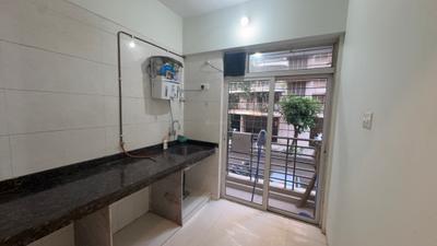 Kitchen Image of 710 Sq.ft 1 BHK Apartment / Flat for sale in Gurukrupa Aramus Galassia, Ulwe Navi Mumbai for Rs. 6100000