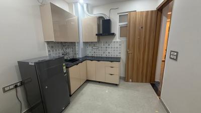 Kitchen Image of 650 Sq.ft 1 BHK Apartment / Flat for rent in Sector 14 Gurgaon for Rs. 32000