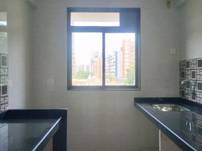 Kitchen Image of 715 Sq.ft 1 BHK Apartment / Flat for sale in Gopal Krishna Krishna Paradise, Kalyan East Kalyan for Rs. 4250000