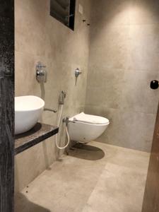 Common Bathroom Image of 660 Sq.ft 1 BHK Apartment / Flat for rent in Bhagwati Neelkanth Heights, Kalamboli Navi Mumbai for Rs. 18000