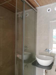 Common Bathroom Image of 1400 Sq.ft 3 BHK Apartment / Flat for rent in Gera World Of Joy, Upper Kharadi Pune for Rs. 75000