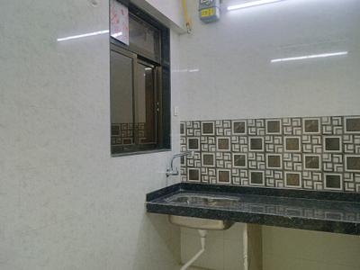 Kitchen Image of 835 Sq.ft 2 BHK Apartment / Flat for sale in Satyam Sheela, Badlapur East Badlapur for Rs. 3500000