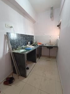 Kitchen Image of 700 Sq.ft 2 BHK Apartment / Flat for sale in Sapnil Residency, Baranagar Kolkata for Rs. 3800000