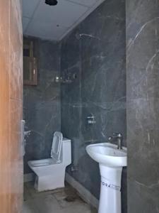 Common Bathroom Image of 1180 Sq.ft 2 BHK Apartment / Flat for sale in Swastik Vikash Infra, Sector 104 Noida for Rs. 4250000
