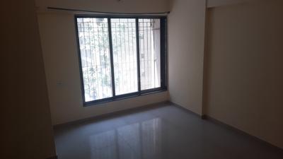 Living Room Image of 590 Sq.ft 1 BHK Apartment / Flat for sale in Raunak Unnathi Greens, Kasarvadavali Thane for Rs. 5500000