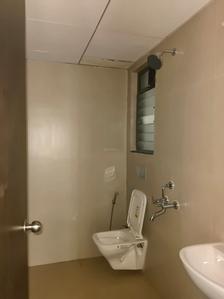 Common Bathroom Image of 870 Sq.ft 2 BHK Apartment / Flat for sale in Runwal My City Phase II Cluster 5 Part III, Usarghar Thane for Rs. 5600000