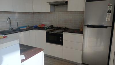 Kitchen Image of 1250 Sq.ft 2 BHK Apartment / Flat for rent in Supertech Supernova, Sector 94 Noida for Rs. 55000