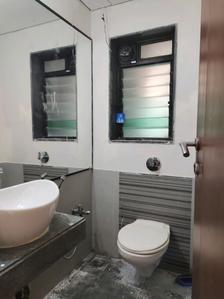 Common Bathroom Image of 1305 Sq.ft 2.5 BHK Apartment / Flat for sale in Rustomjee Elanza, Malad West Mumbai for Rs. 37500000