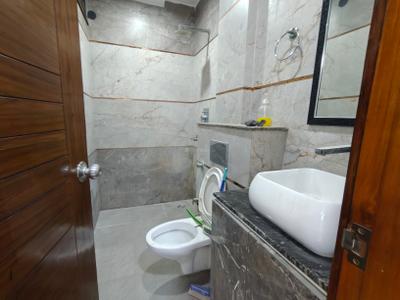 Bathroom Image of 372 Sq.ft 1 BHK Studio for rent in DLF Capital Greens Phase 1 And 2, Karampura New Delhi for Rs. 25000