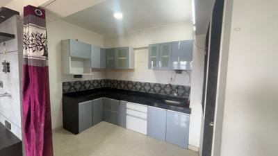 Kitchen Image of 706 Sq.ft 2 BHK Apartment / Flat for rent in Unique Prospero, Lohegaon Pune for Rs. 25000